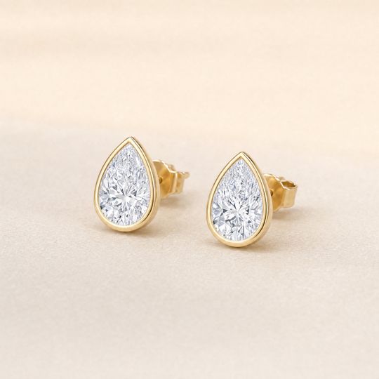 Pear Bezel Diamond Studs Yellow Gold Lifestyle