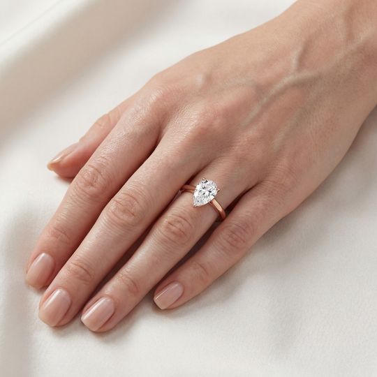 Belle Pear Rose On Hand Jpg