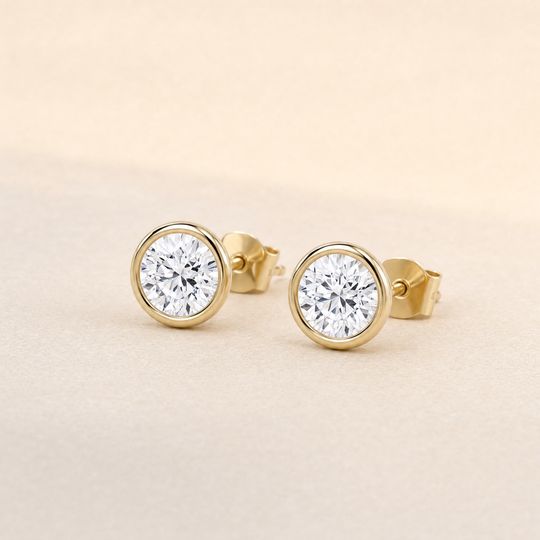 Round Bezel Diamond Studs Yellow Gold Lifestyle